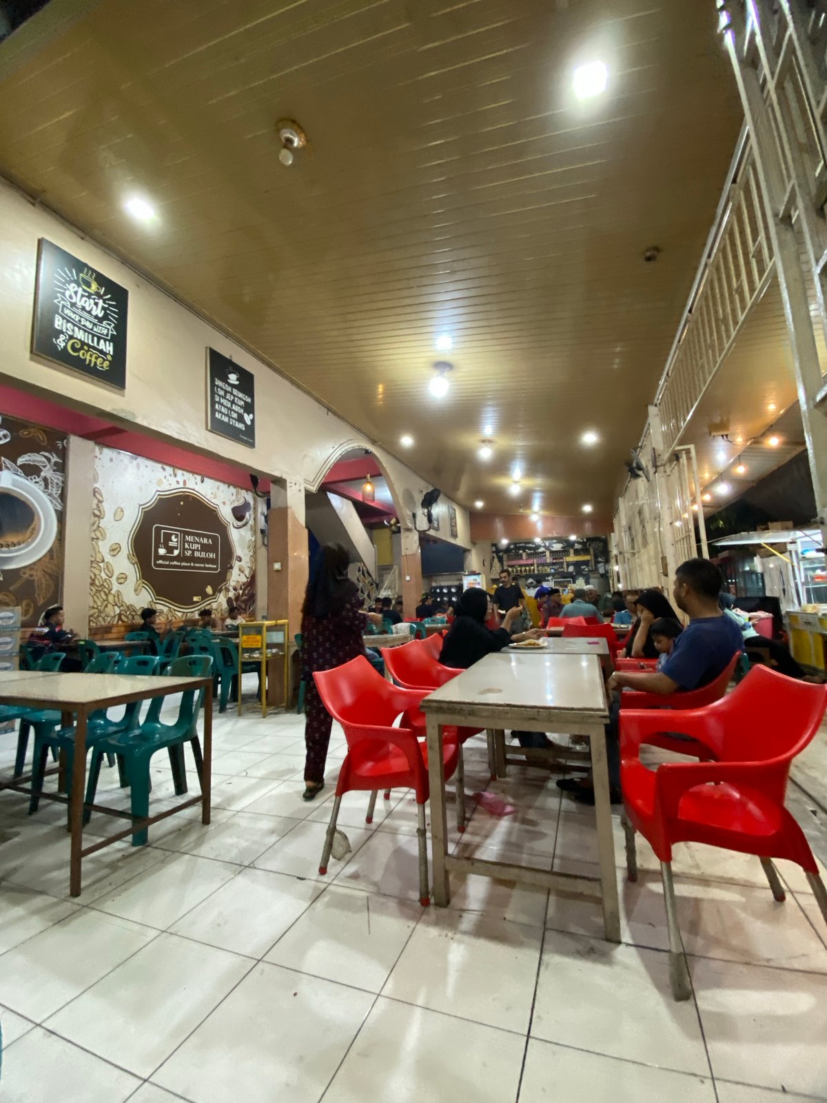 Lhokseumawe street food scene: cafes, stalls, and charcoal griddles