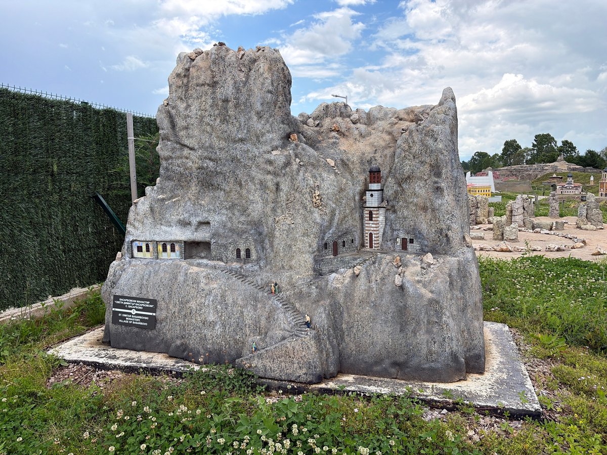 Tourist documents Bulgarian miniature park featuring historical landmarks