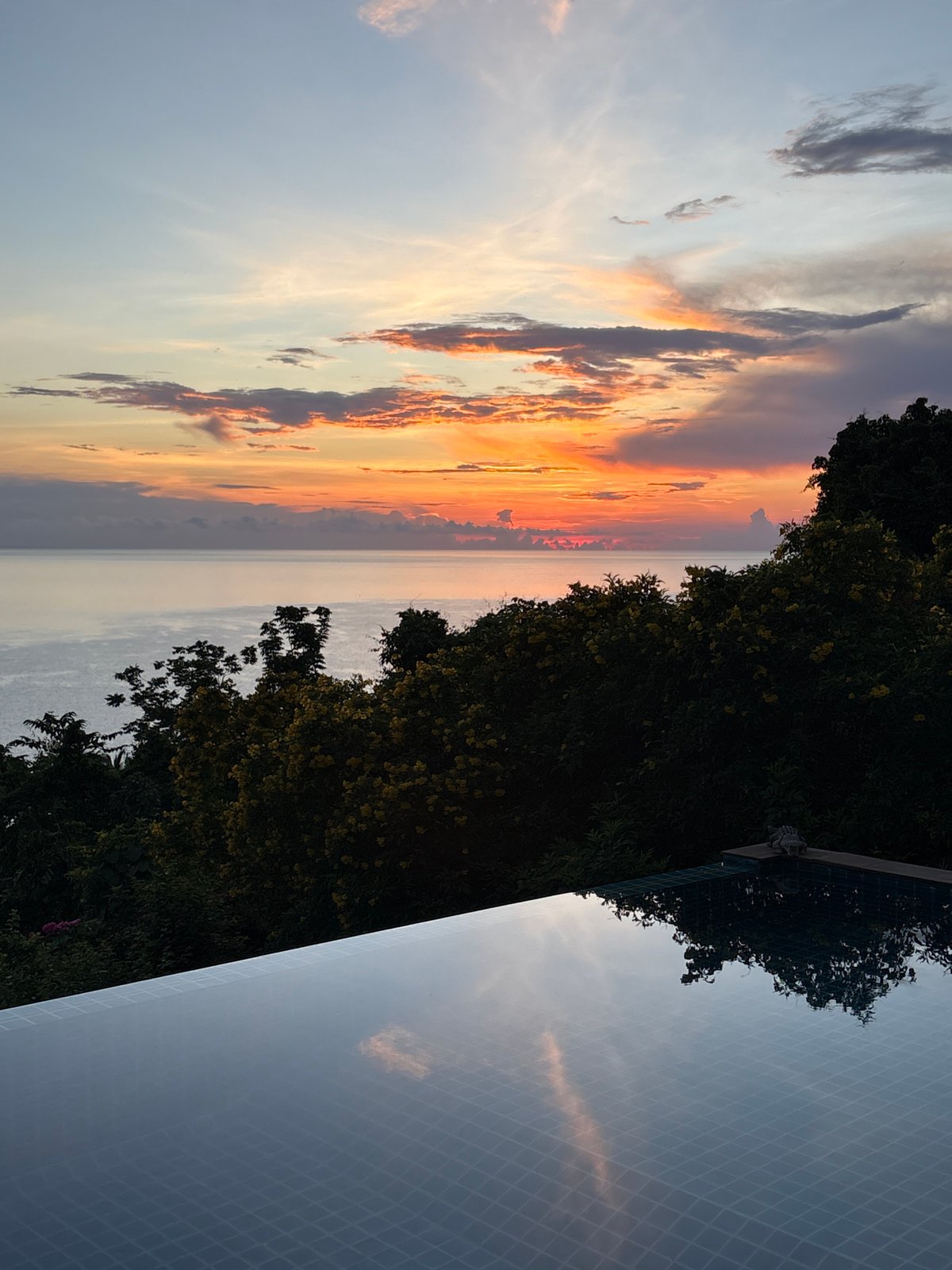 Sunset viewed from infinity pool in Ko Samui
