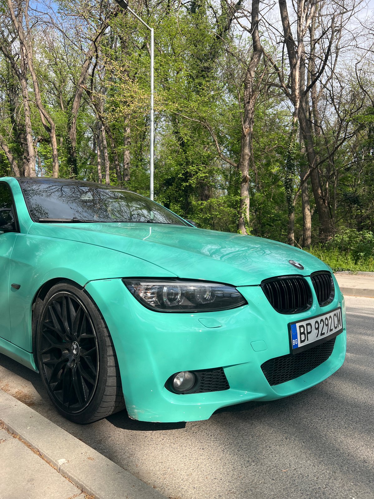 Spring afternoon scenes documented around Plovdiv, Bulgaria including parked BMW