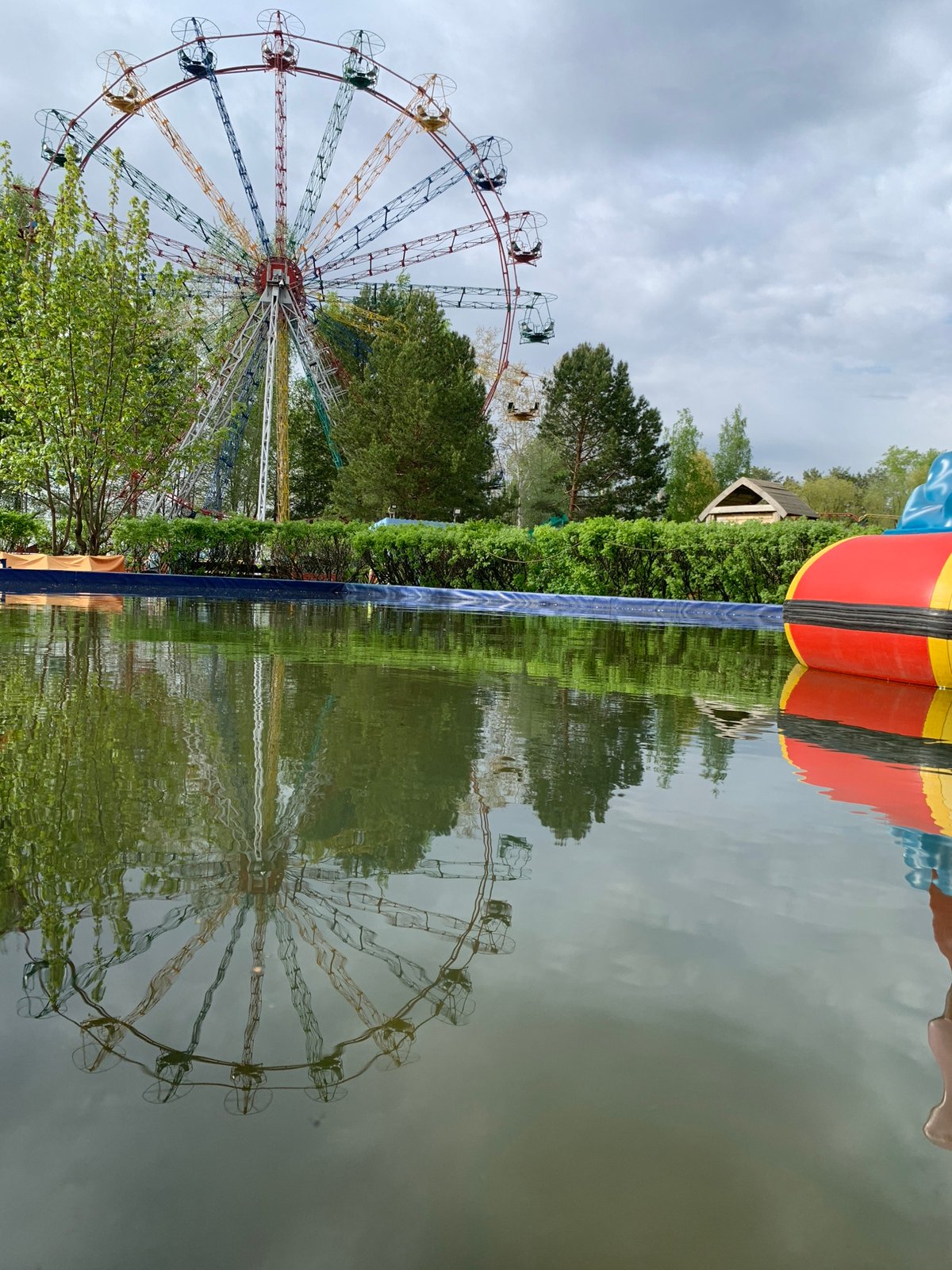 Visitors document leisure activities at Chaikovsky amusement park