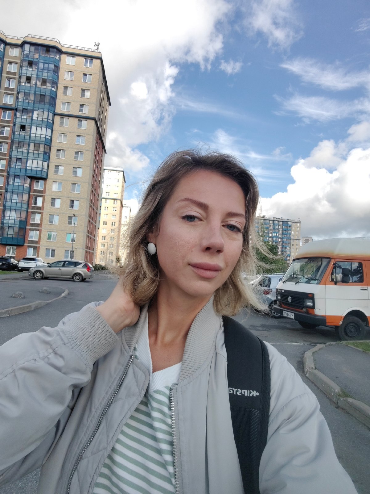 Outdoor selfie in Saint Petersburg, casual layered look