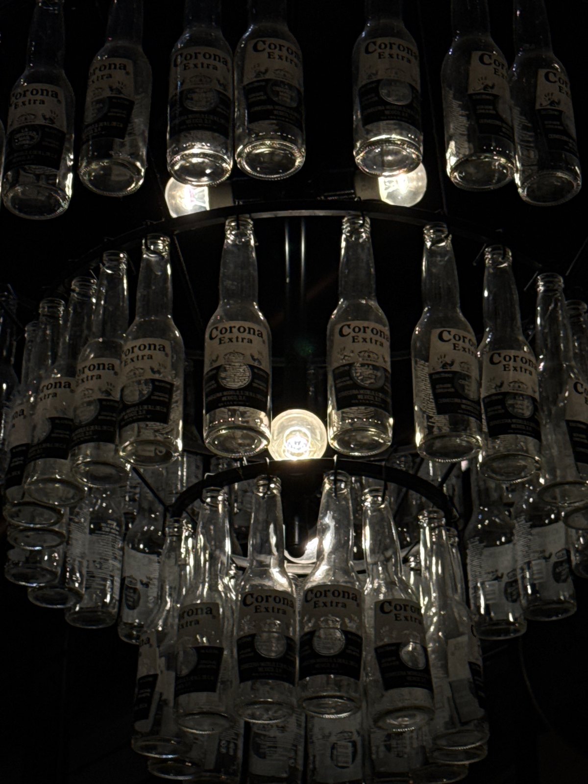 Corona bottle chandelier spotted in Luxembourg venue