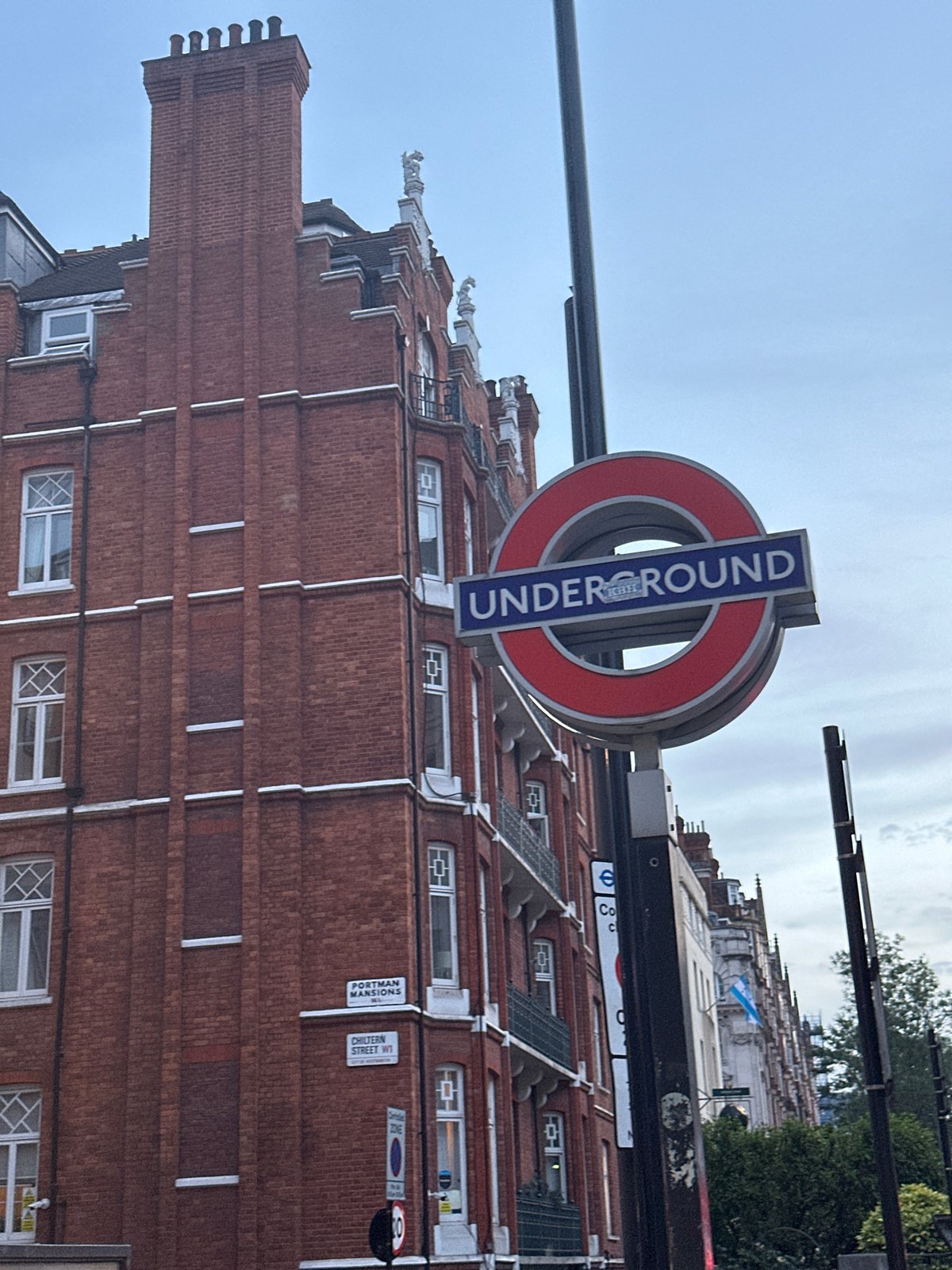 London street scenes show Underground signs, bike shares, traffic