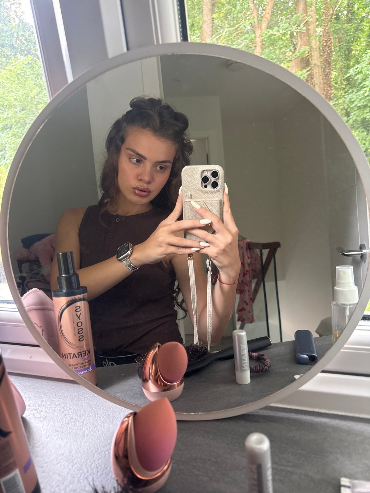 Mirror selfie session at a Throop home, indoors and out