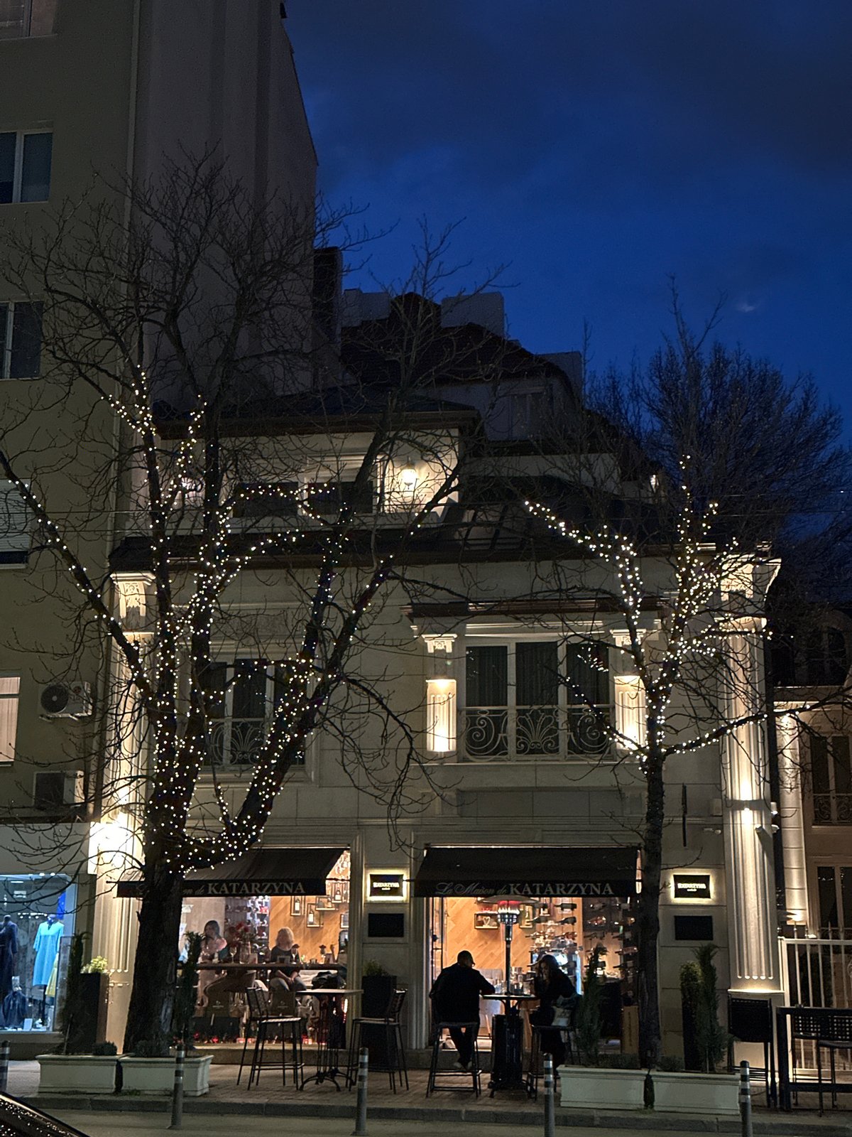 Evening stroll documented through illuminated Sofia streets
