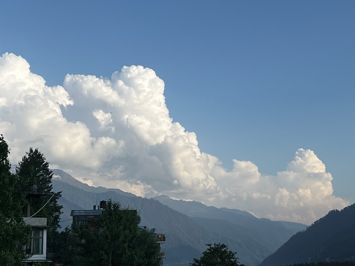 Tourist captures diverse Vashisht mountain village scenes during afternoon