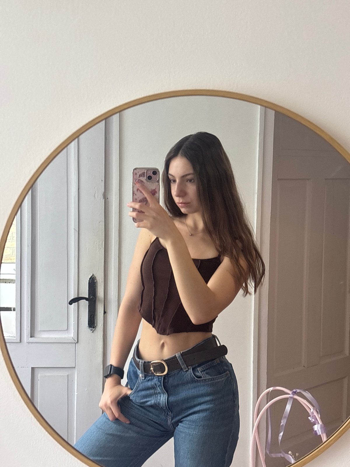 Woman Takes Mirror Selfies with Hello Kitty in Bulgaria