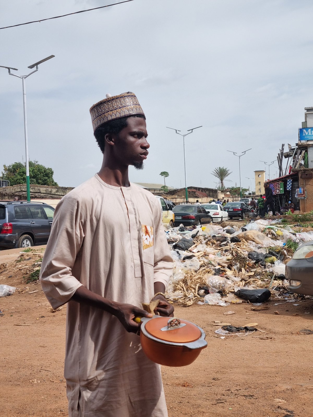 Daily life unfolds across Jos, Nigeria streets and markets