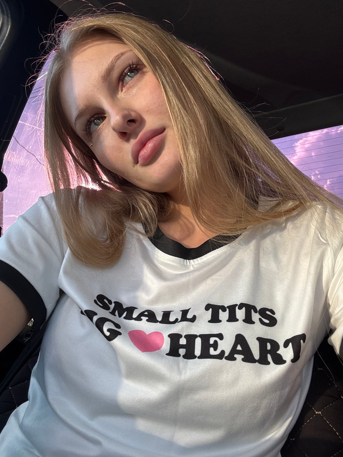 Car selfie session with party crown in Perm