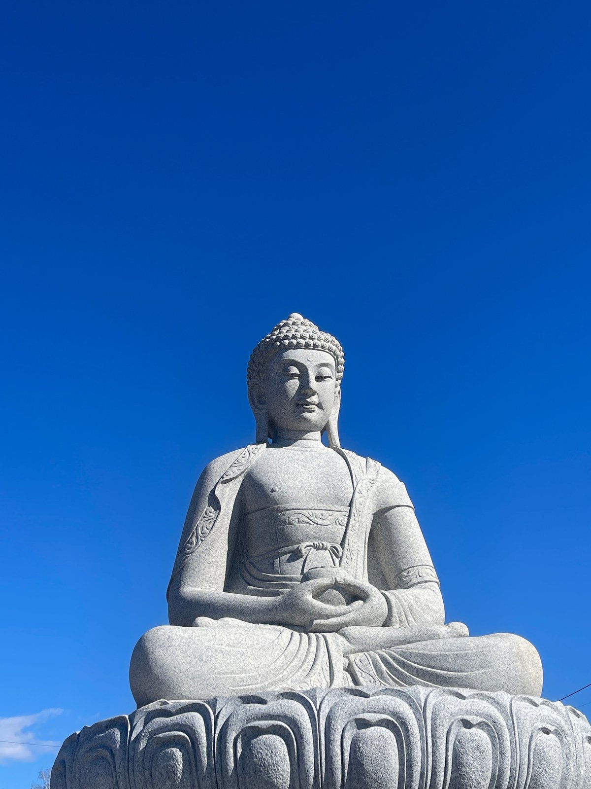 Buddha statue photographed overlooking Krasnoyarsk, Russia