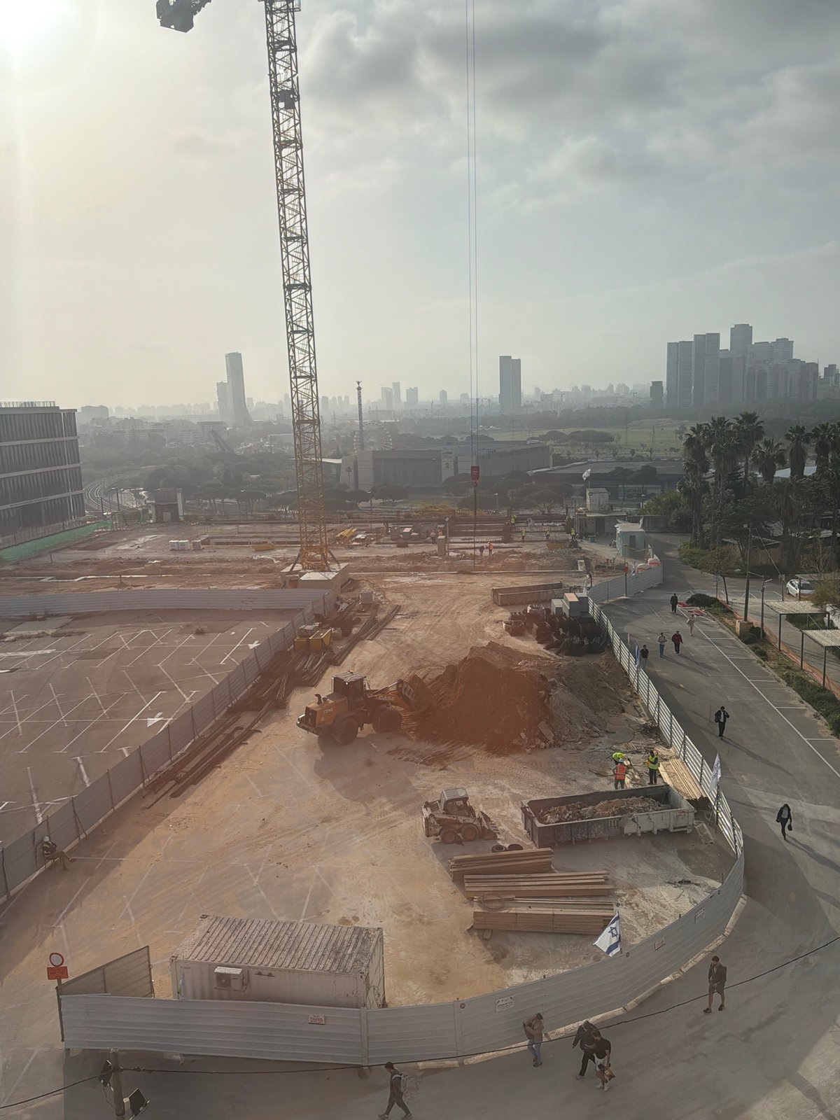 Construction crane operates at Tel-Aviv building site
