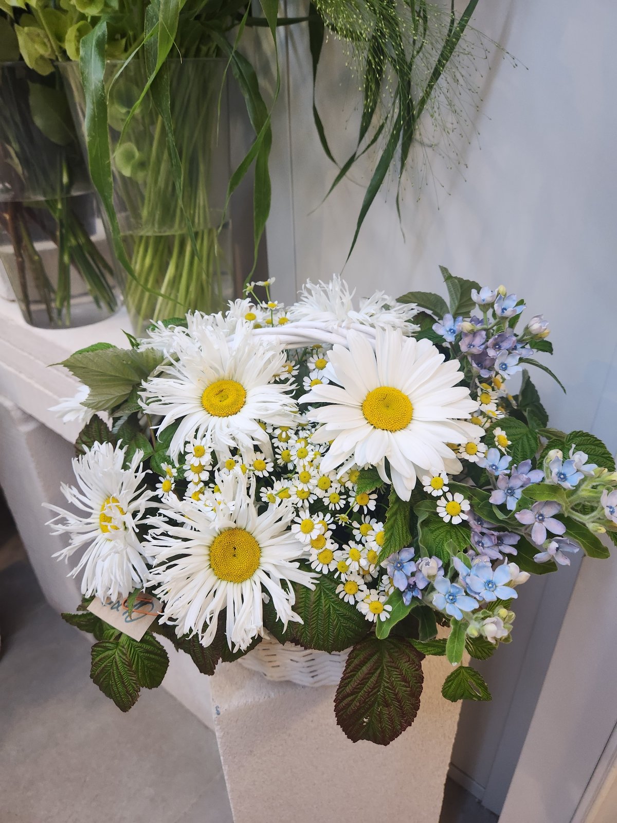 Moscow flower shop displays a spread of fresh summer bouquets