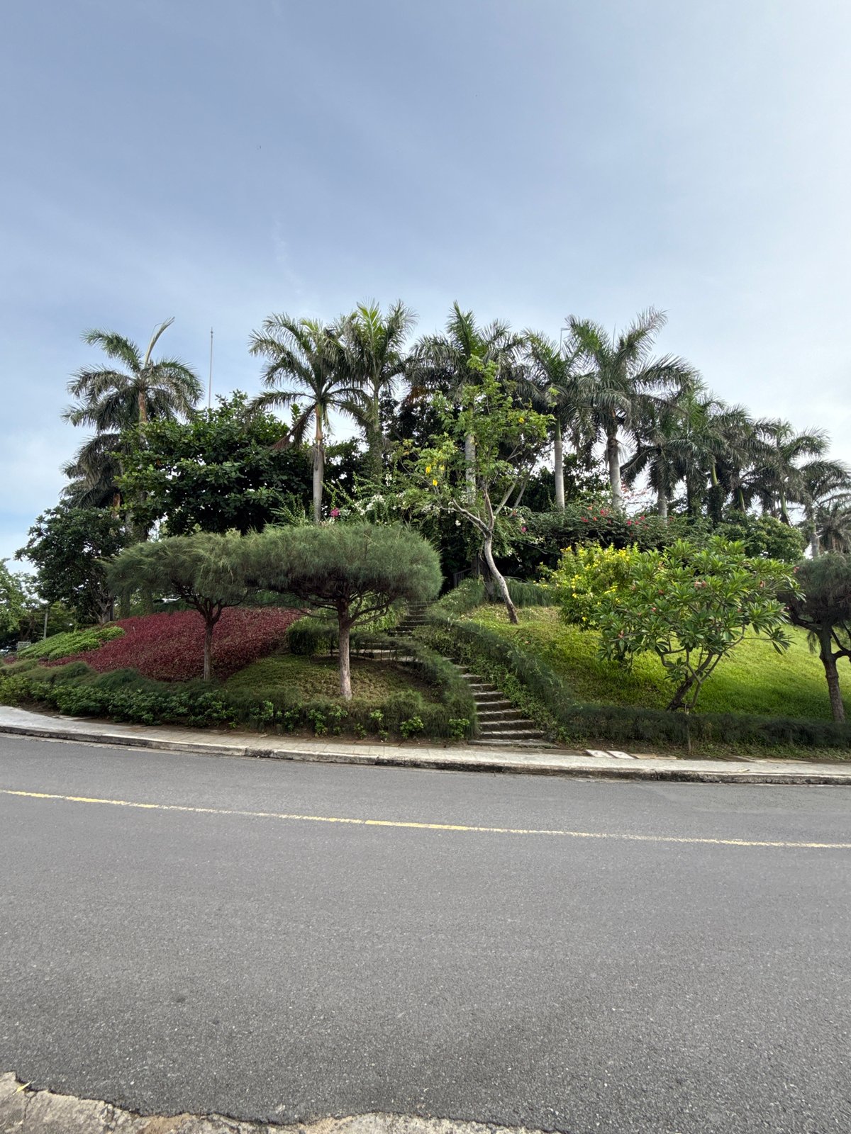 Tourist explores Nha Trang coastal attractions under overcast morning skies