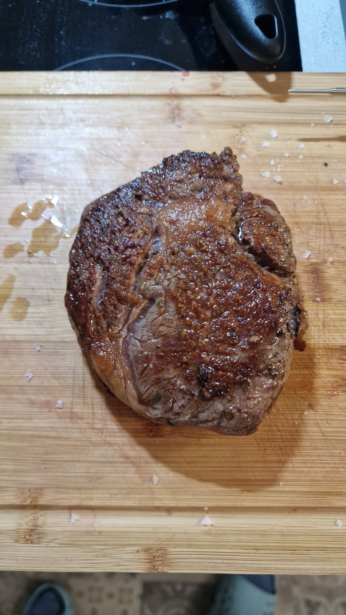 Medium-rare steak served on cutting board in Sofia