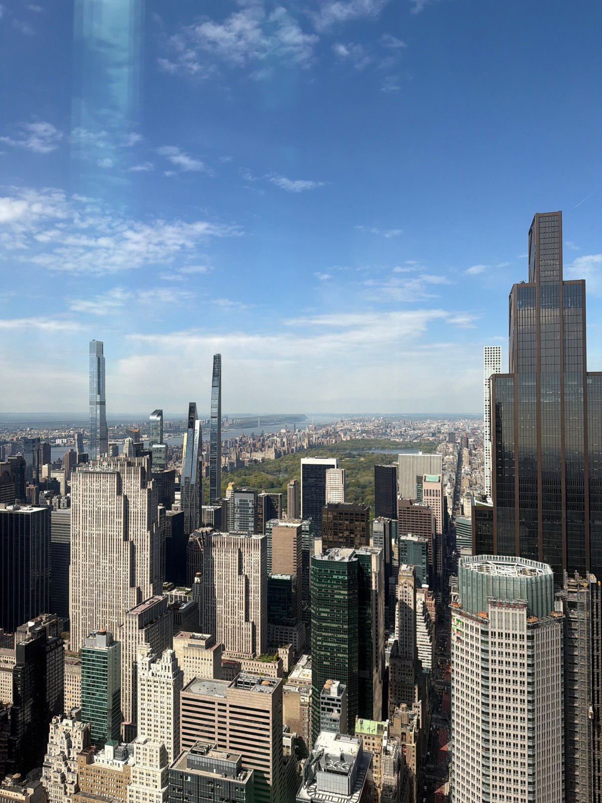 Visitors gather at NYC observation deck on clear evening