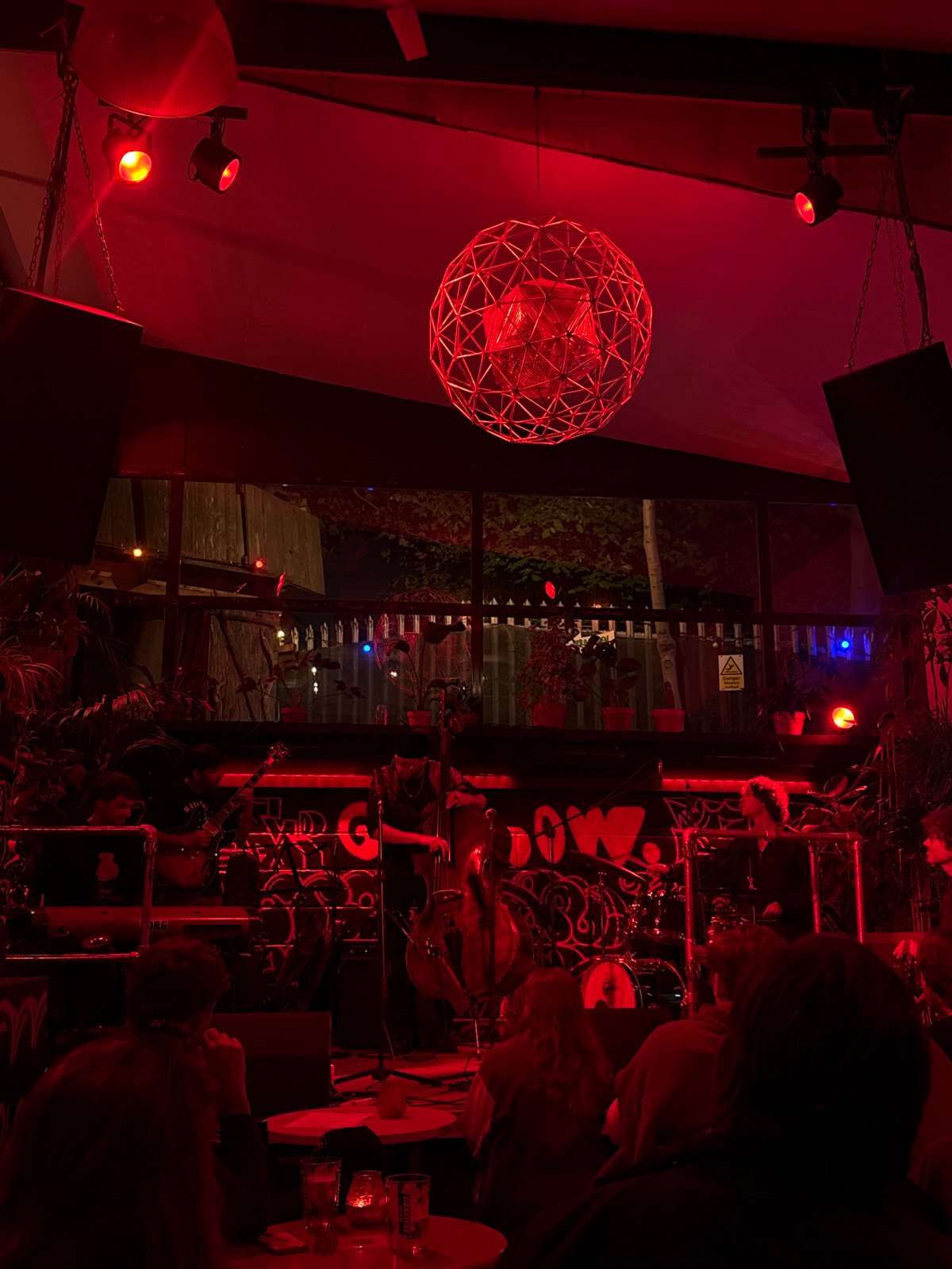 London venue interior captured with distinctive red geodesic lighting