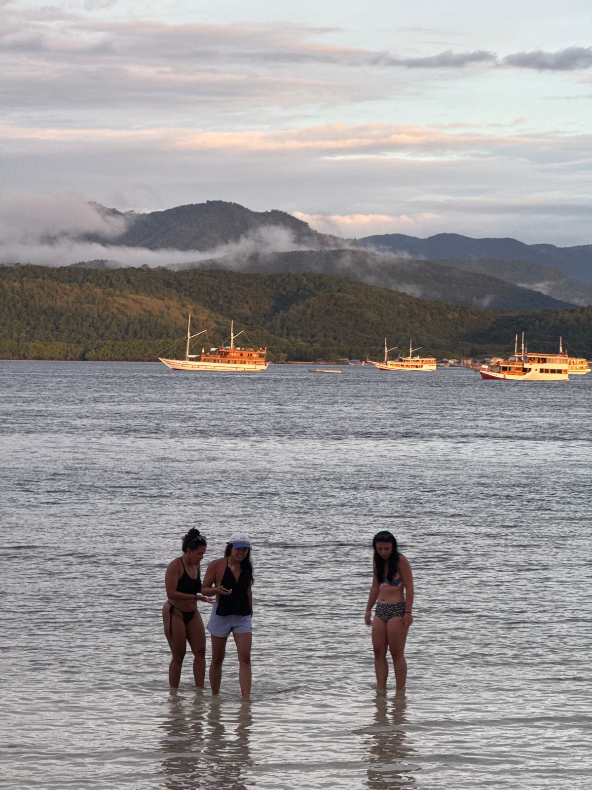 Beach volleyball and water activities observed in Rinca Village