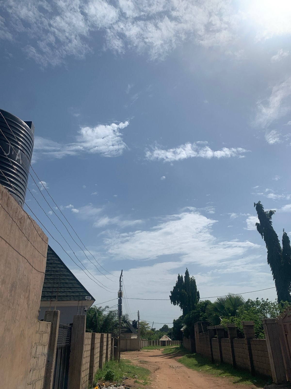 Afternoon hangout at a casual outdoor spot in Howayi, Nigeria