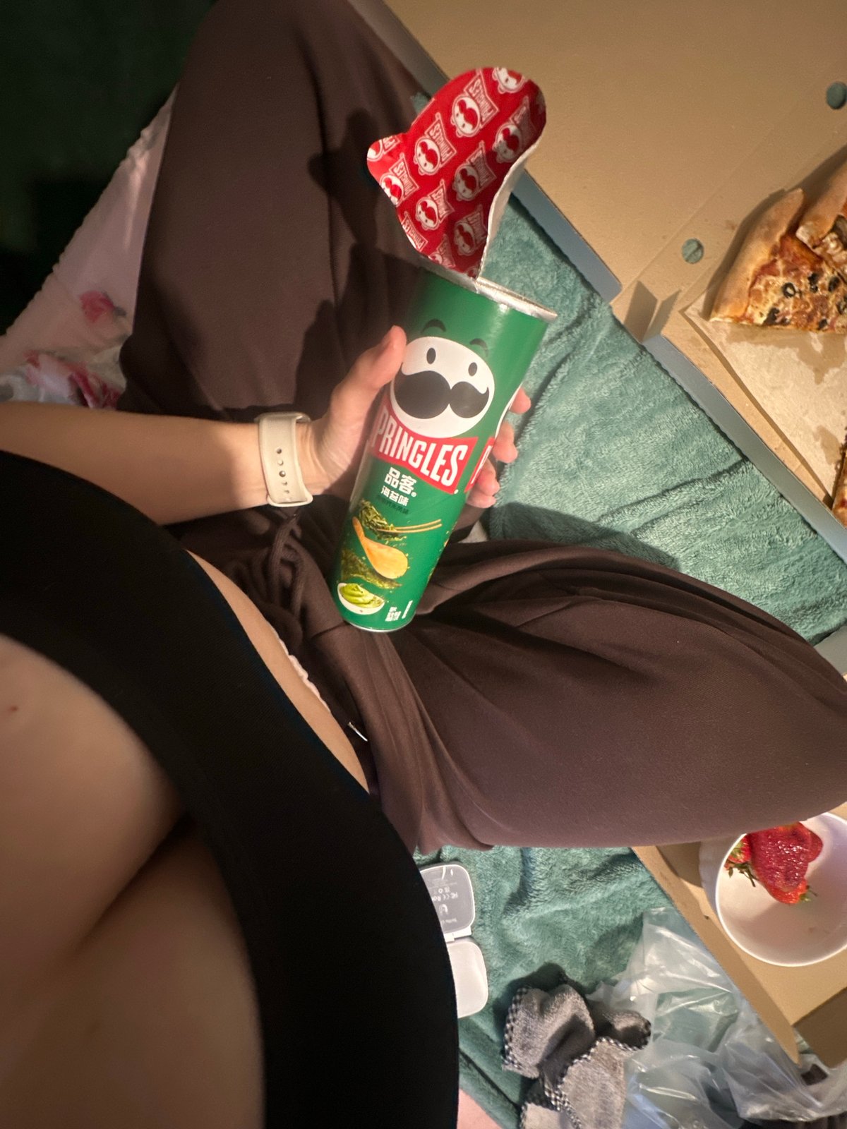 Casual dinner documented in Perm featuring pizza and snacks