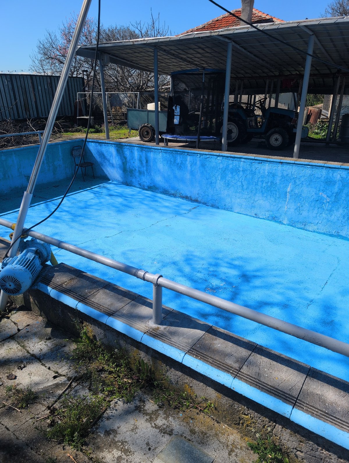 Empty blue pool observed in Tyurkmen, Bulgaria