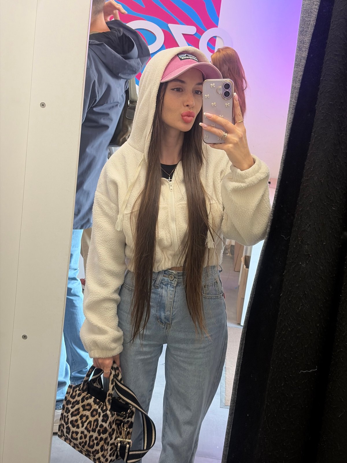 Woman takes selfies in Saint Petersburg fitting room