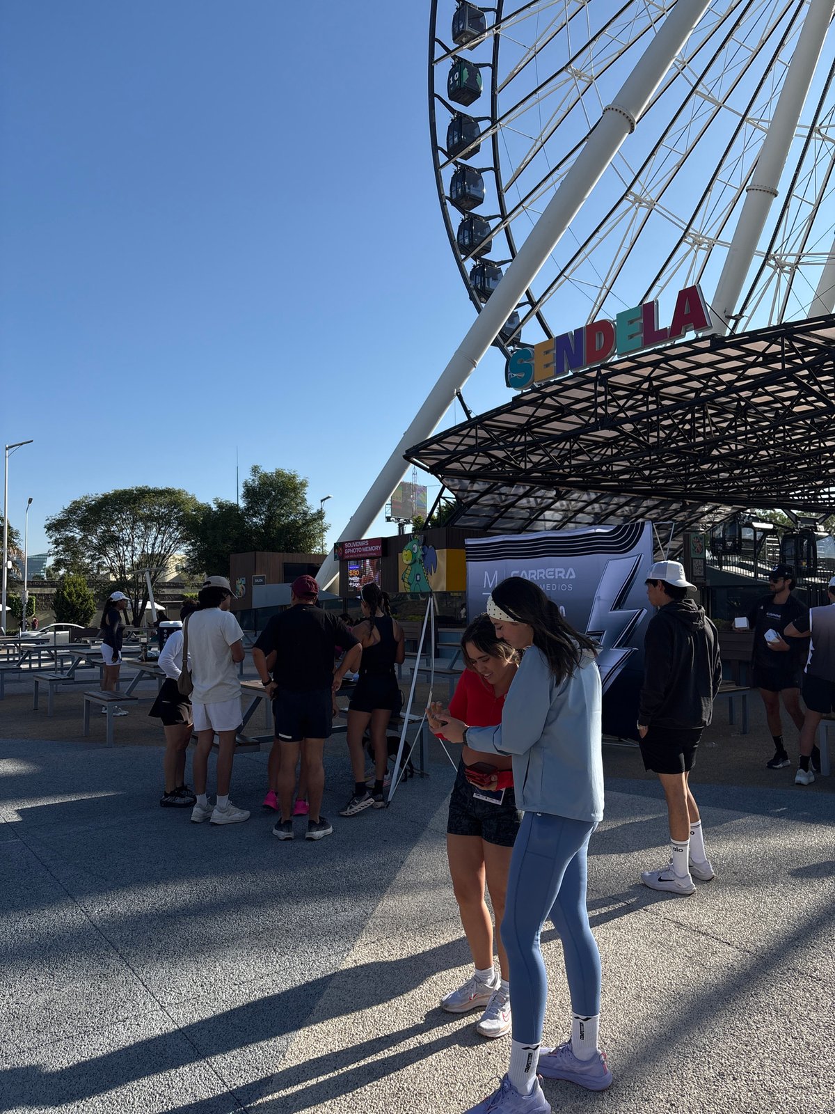 Afternoon activity documented around Puebla's Estrella de Puebla Ferris wheel