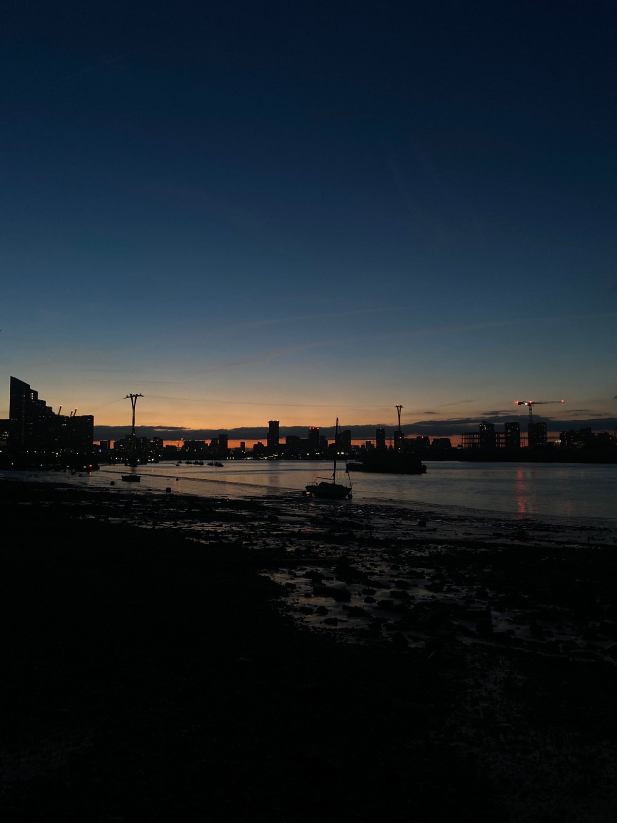 London skyline at dusk, Thames-side as night falls