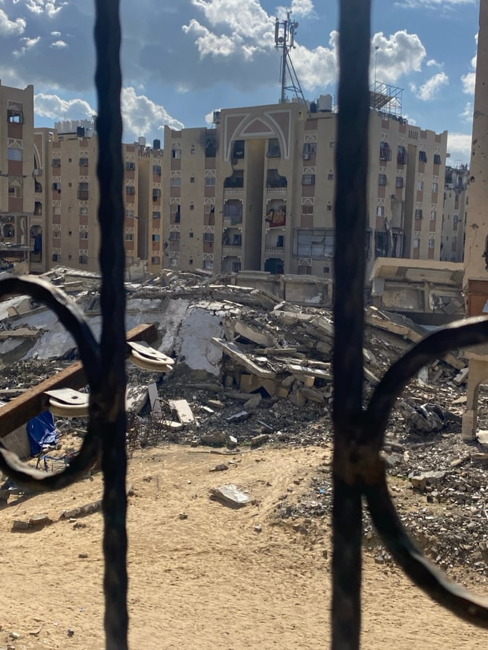 Structural damage documented in Khan Yunis through security bars