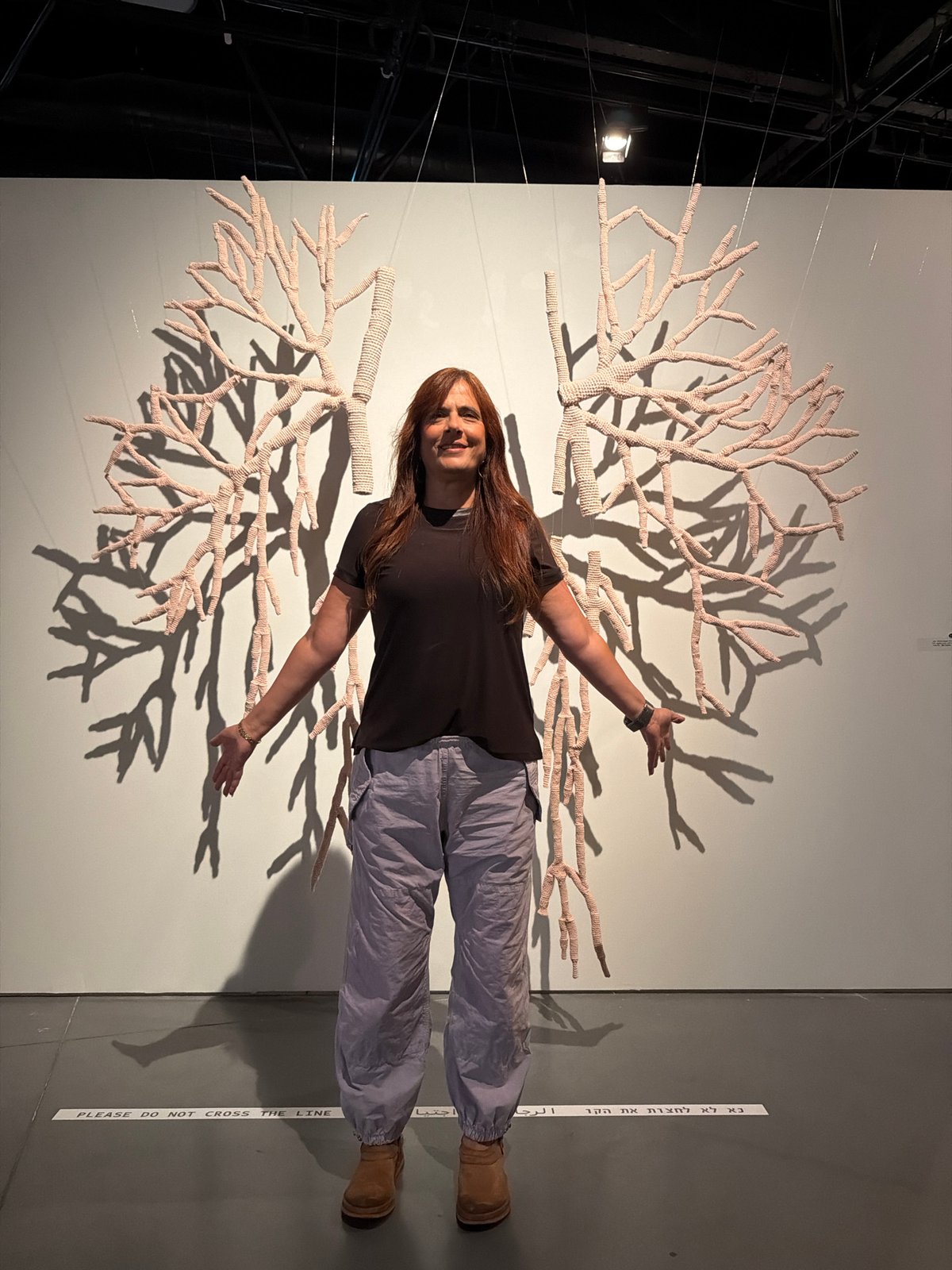 Gallery visitors explore art installations in Tel-Aviv museum