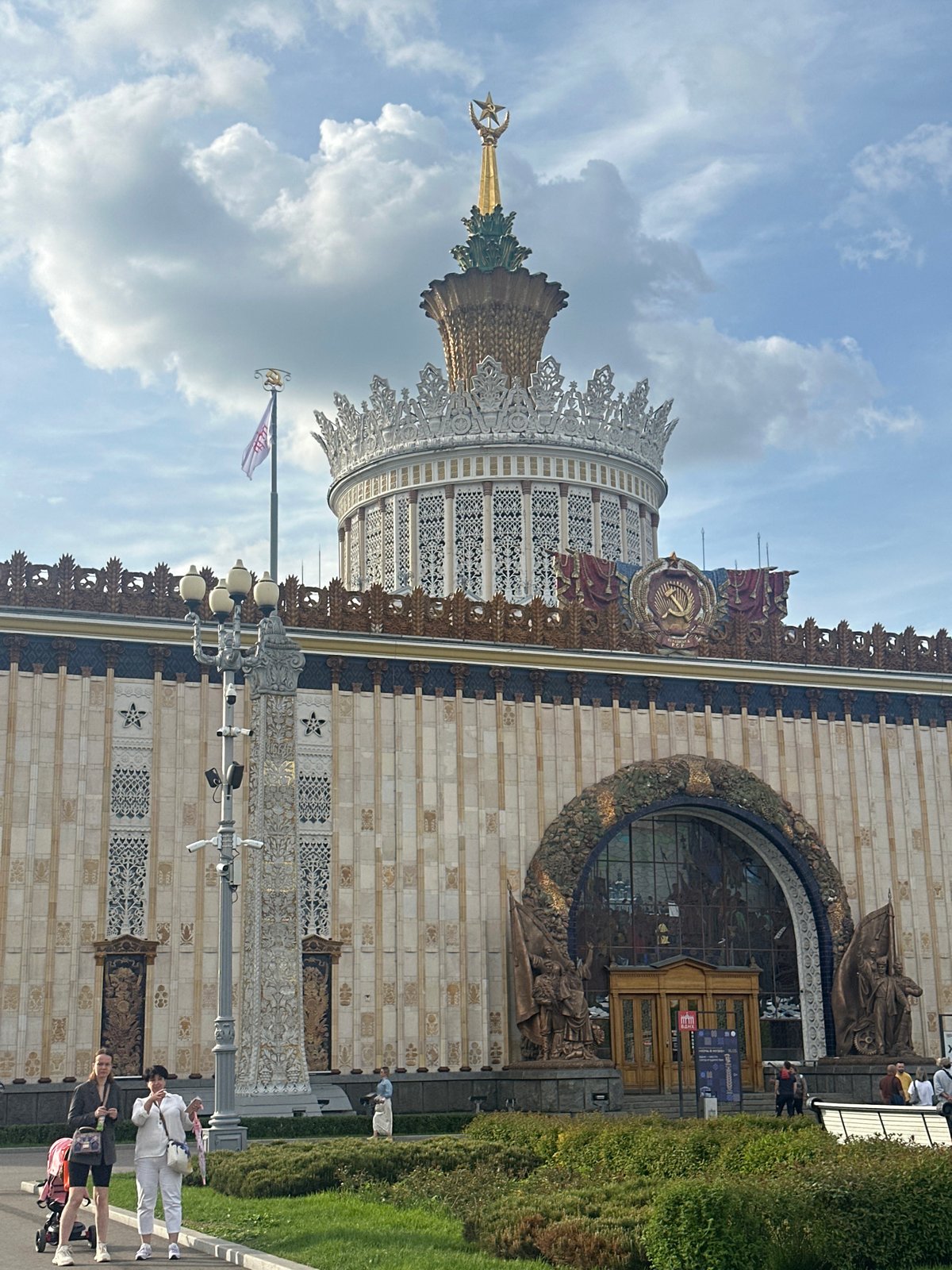 Visitor documents VDNKh landmarks and wildlife in Moscow afternoon