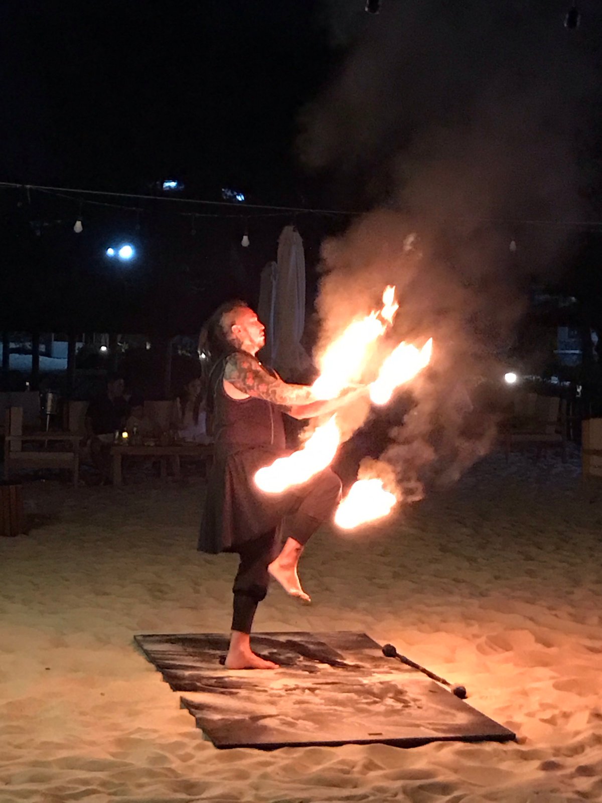 Fire performers take the beach at a Vietnam beachfront bar night