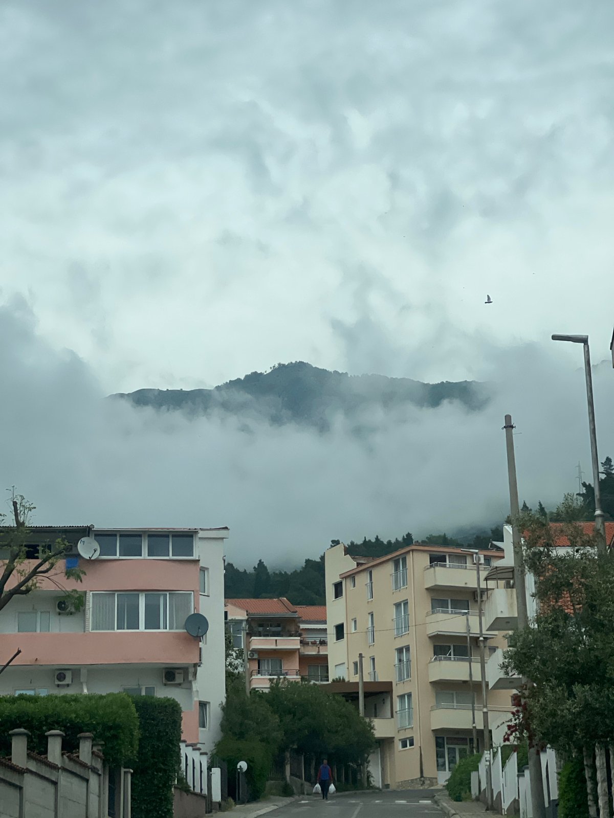 Fog blankets mountains near Budva, Montenegro coastal area