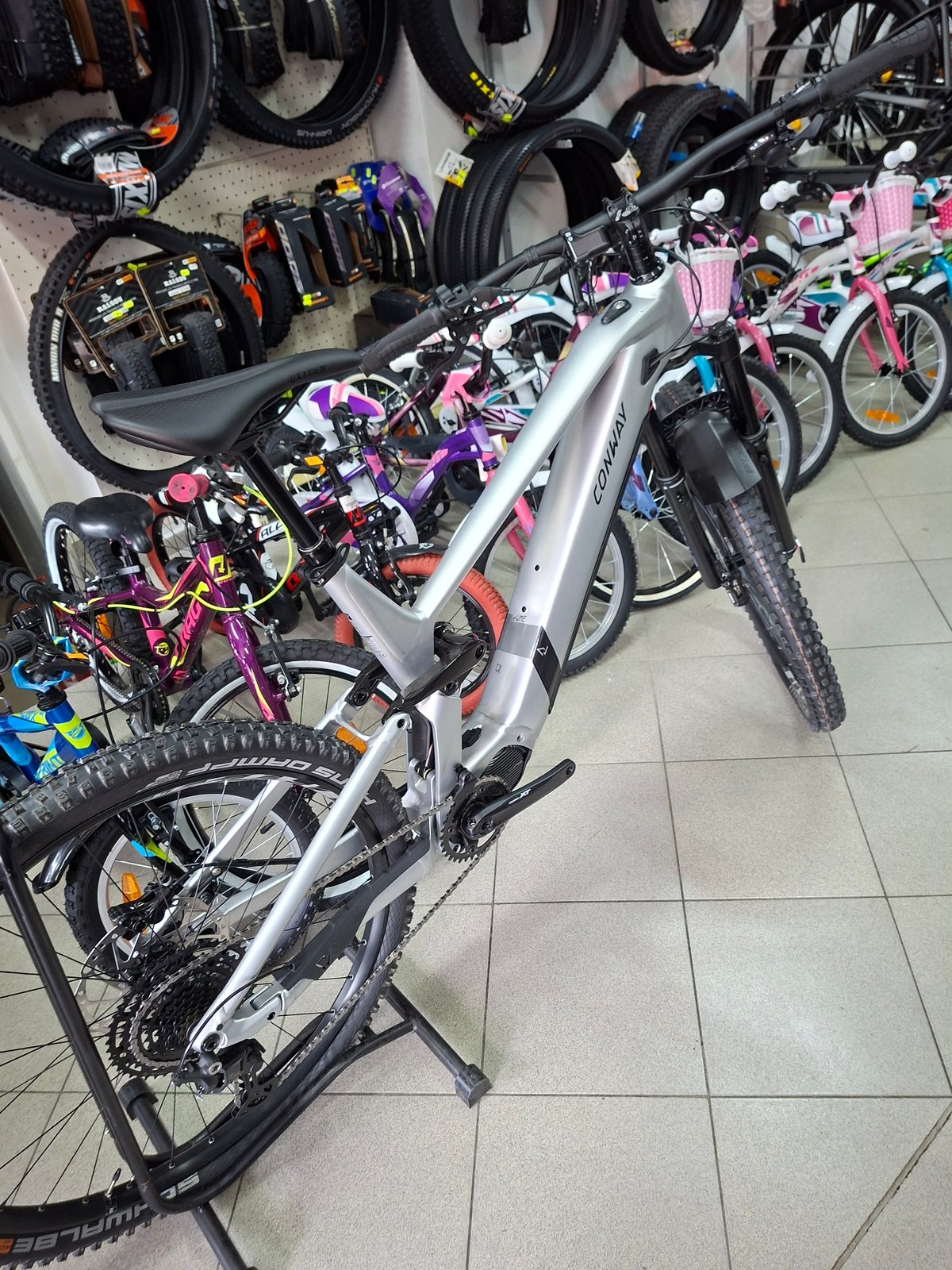 Morning scenes in Gabrovo: bicycle shop and sleeping cat