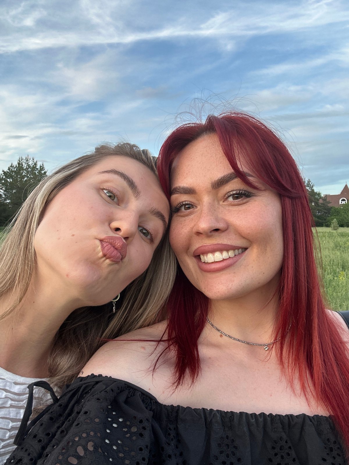 Women photograph themselves in Tolyatti parks during afternoon outing