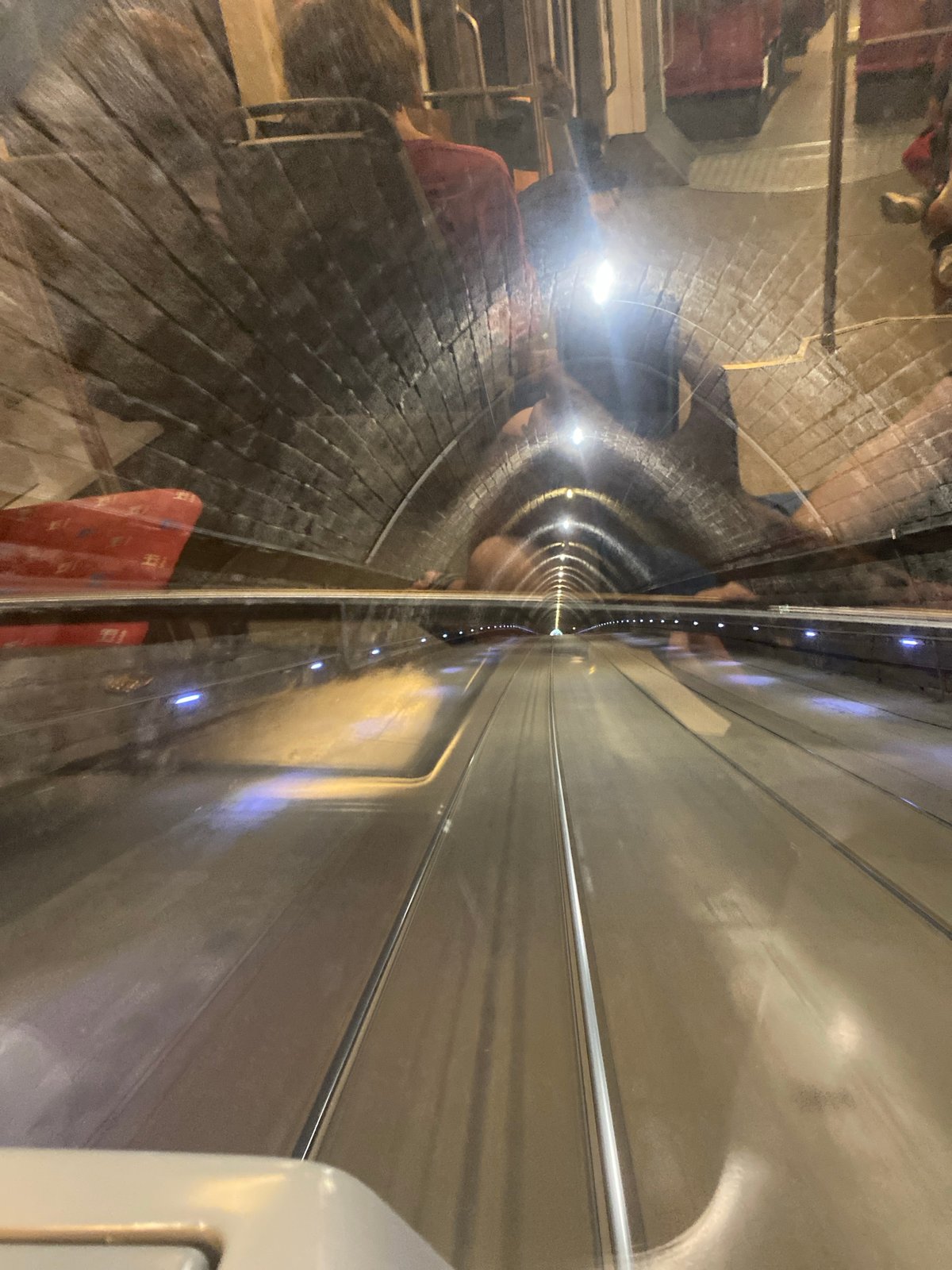Bratislava tram emerging from a brick tunnel