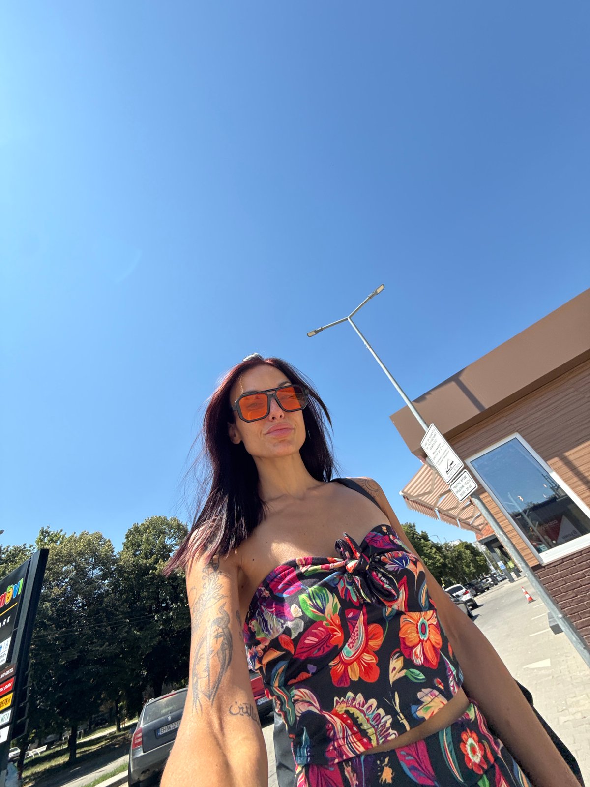Sunny morning selfies in Pleven, floral outfit and orange shades