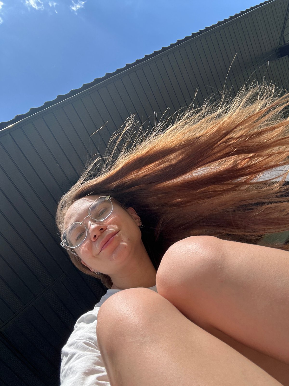 Woman photographed upside-down in Kharnavy, Russia