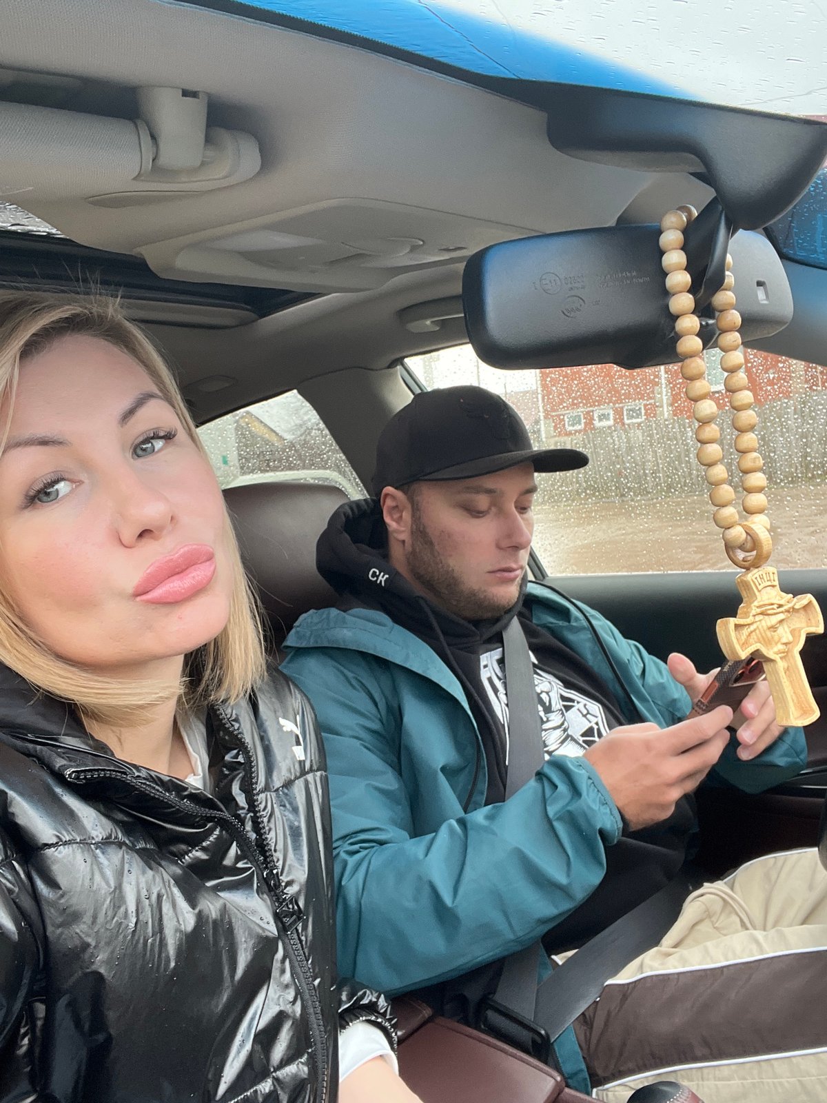 Two people observed in car interior in Chaikovsky