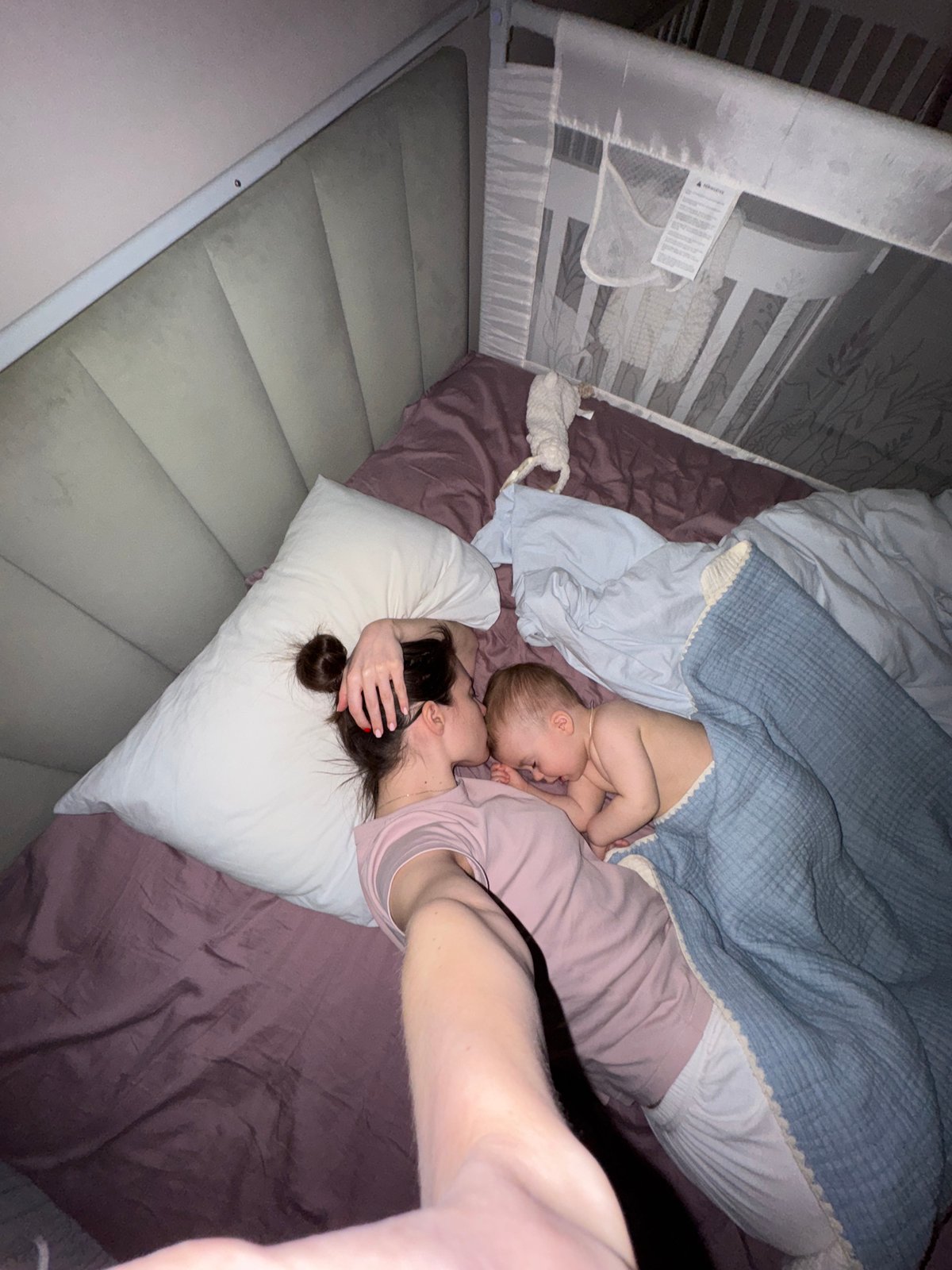 Mother and infant share quiet morning moments in Moscow home