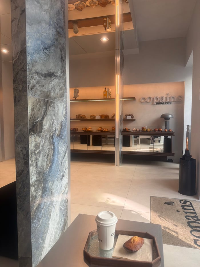 Modern Parisian bakery Copains Invalides captured in morning documentation