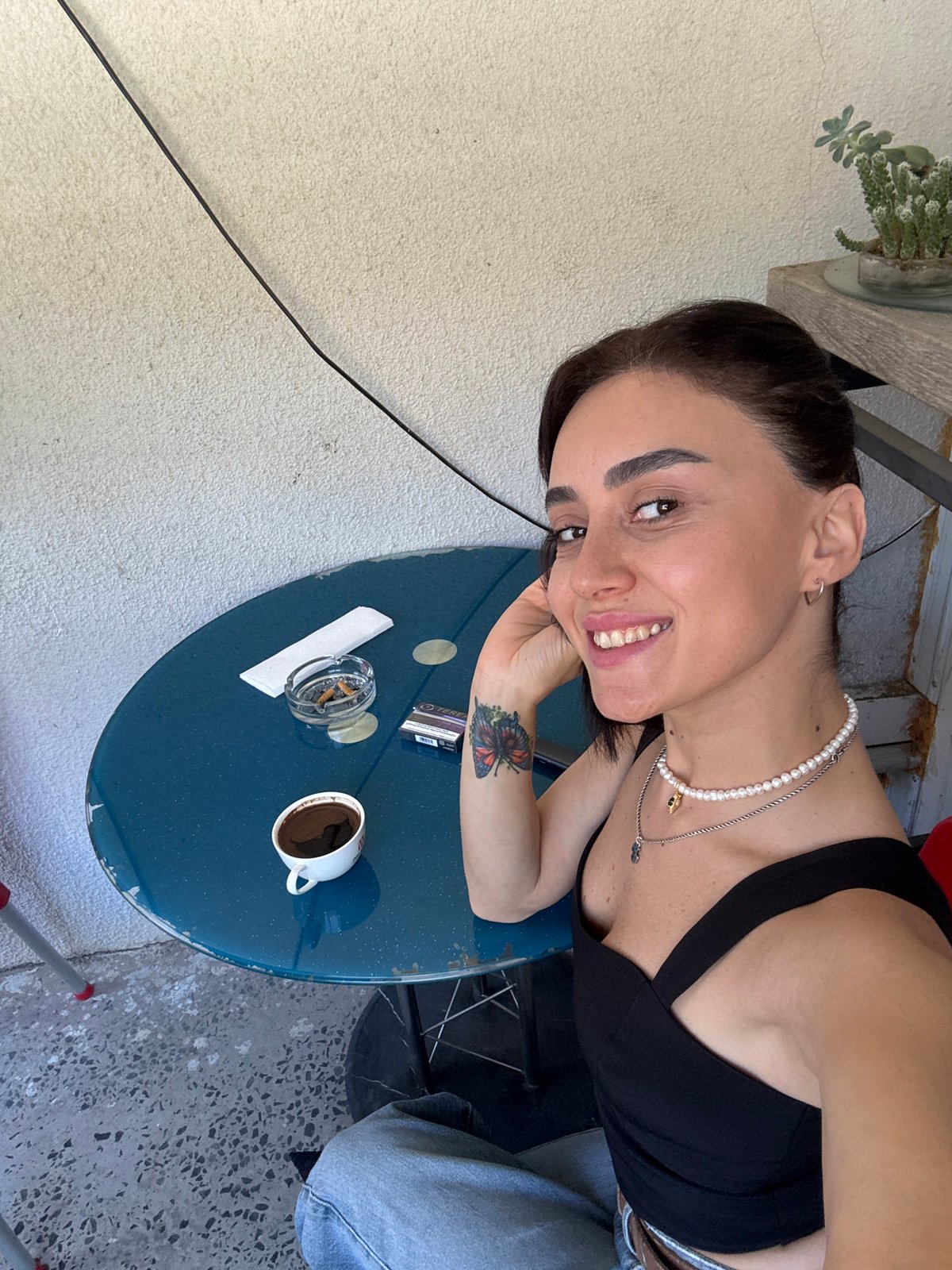 Casual Tbilisi morning: coffee, selfies, and city streets
