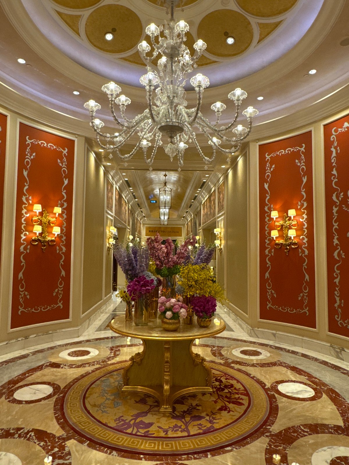 Ornate ceiling fresco documented in luxury Macao interior