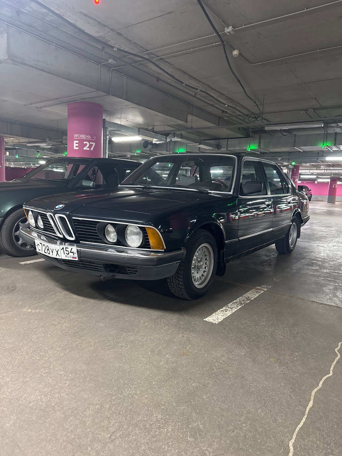 BMW sedan parked in Saint Petersburg underground garage