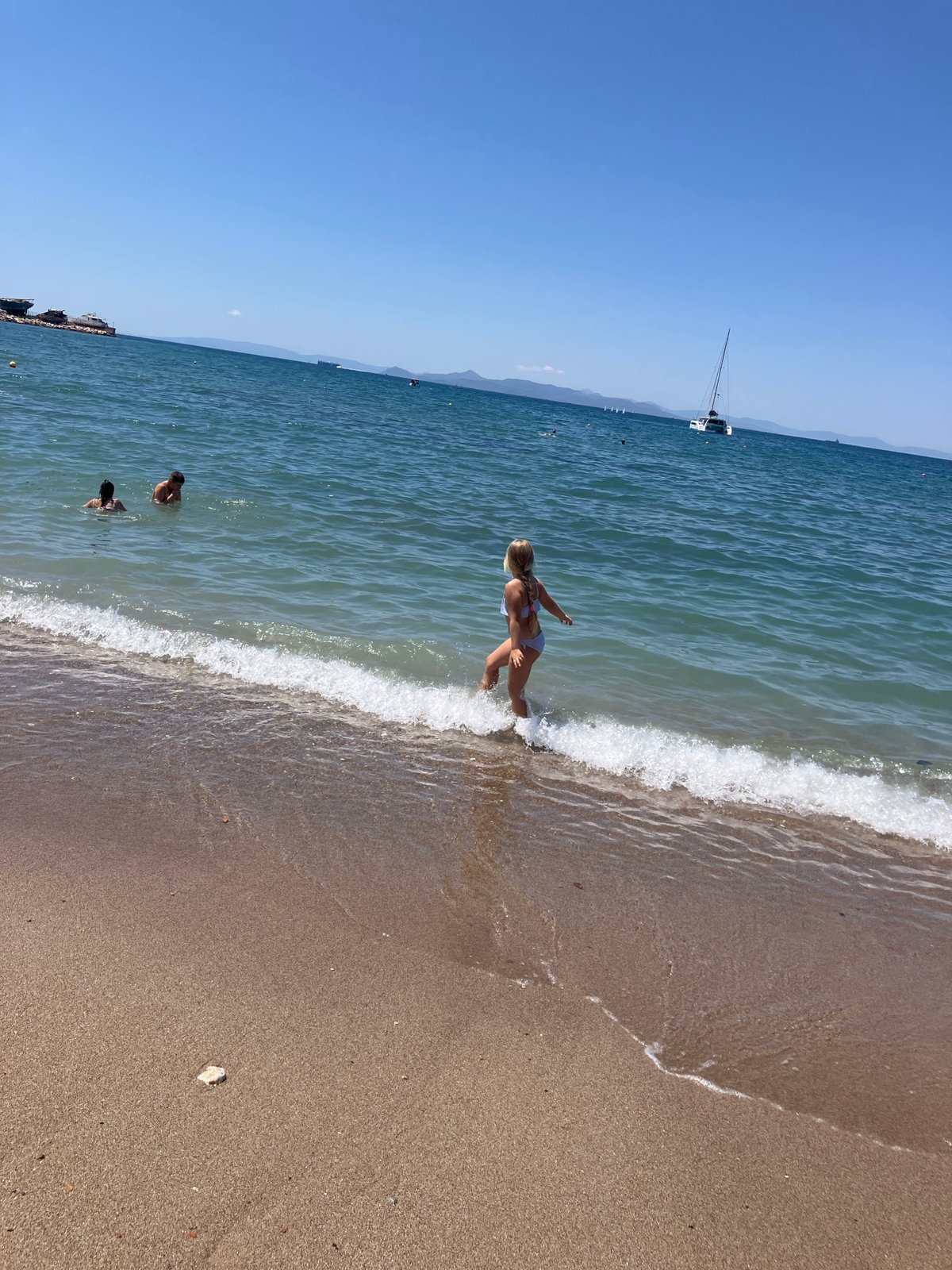 Relaxed summer morning at a sunny Athens beach