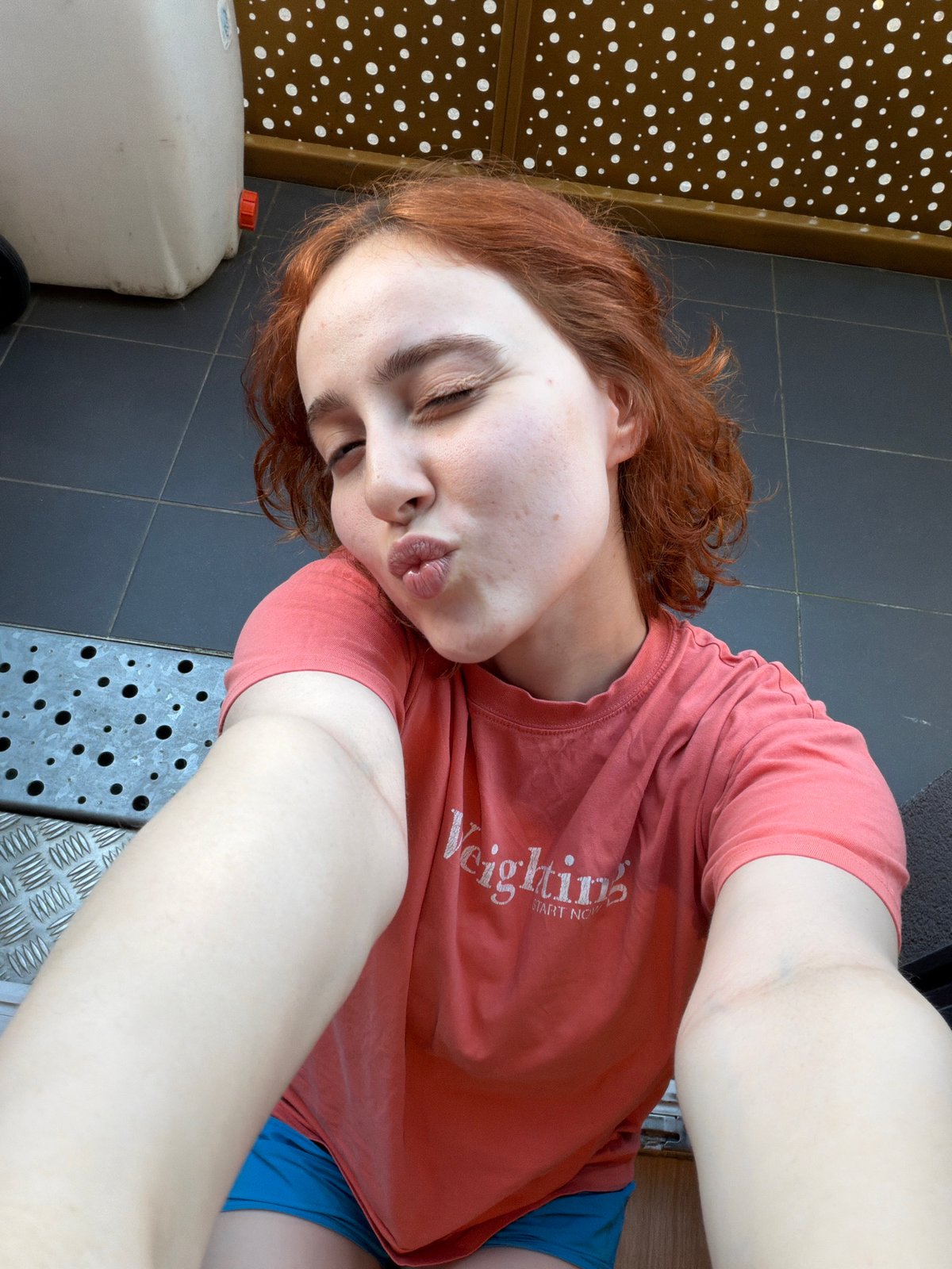 Woman takes playful selfies in multiple poses in Strasbourg
