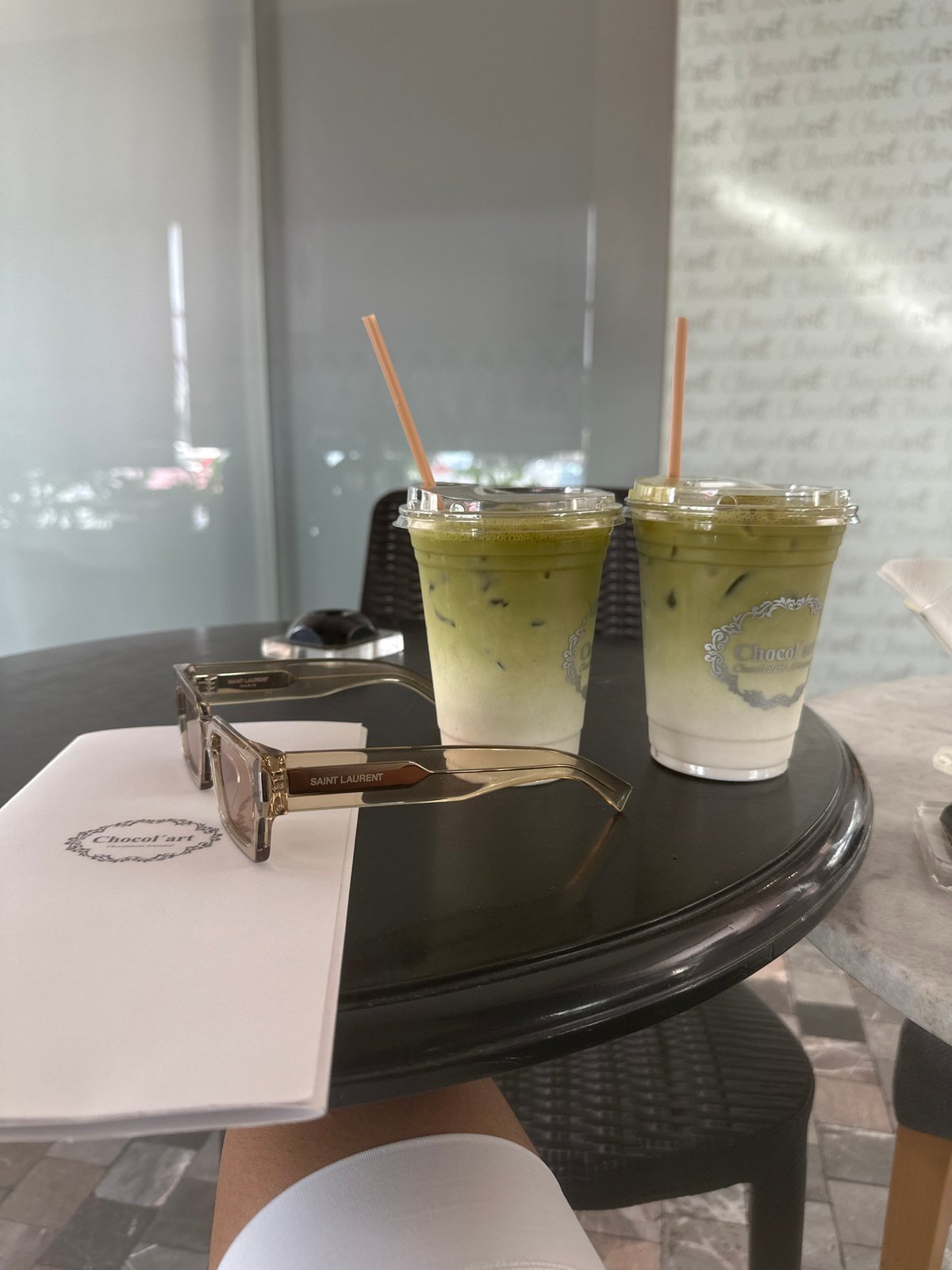 Customer enjoys matcha lattes at Puebla chocolate cafe