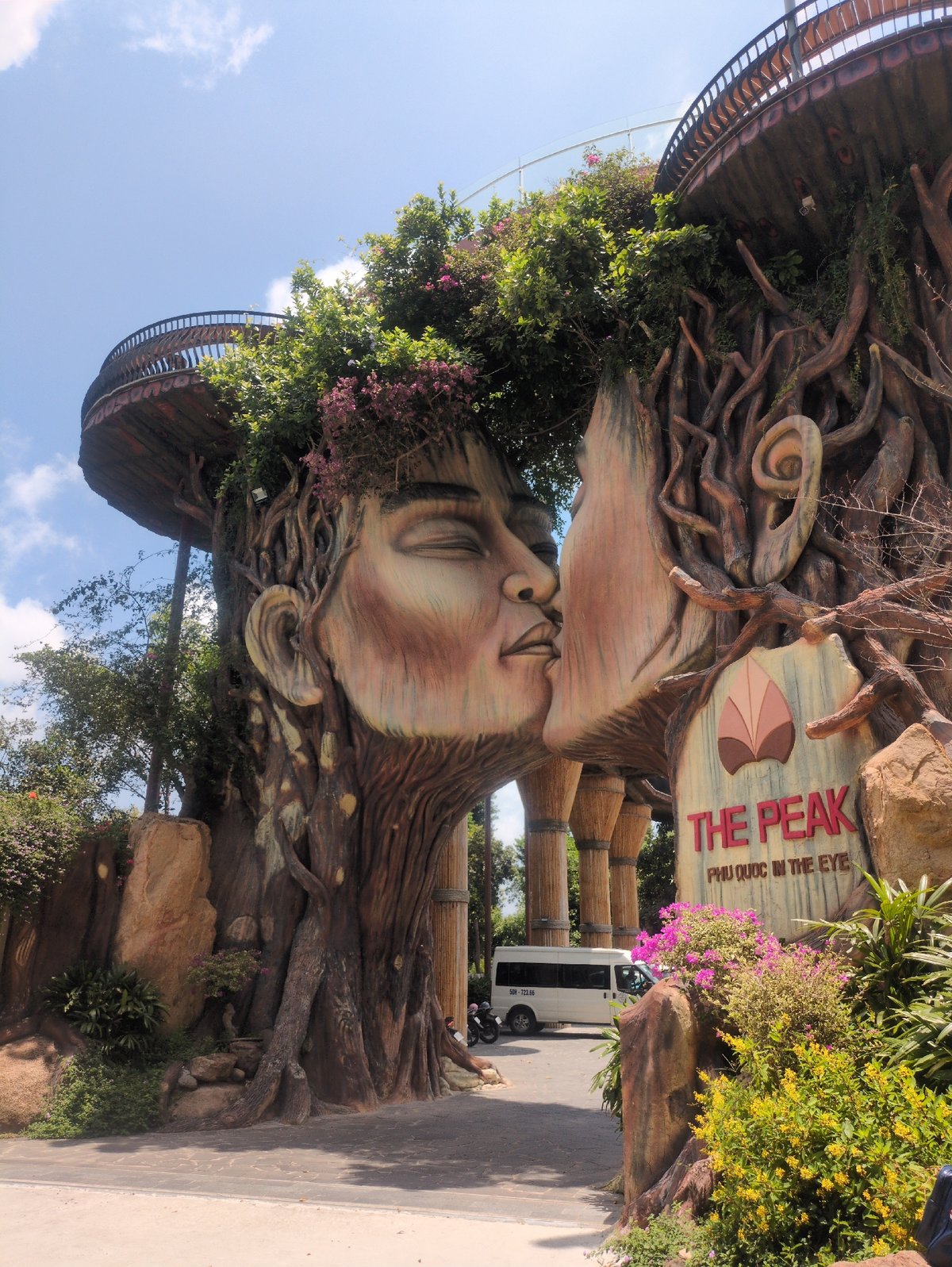 Tourist explores Phú Quốc forest trails and kissing faces sculpture