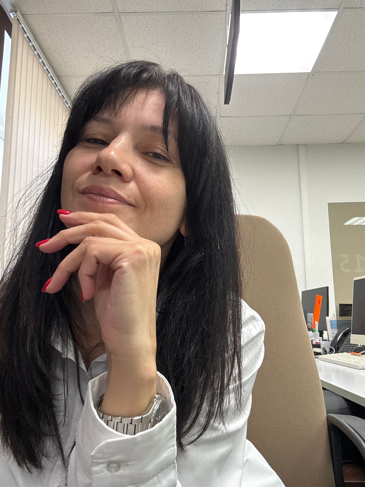 Woman takes selfies with child in Chaikovsky office space