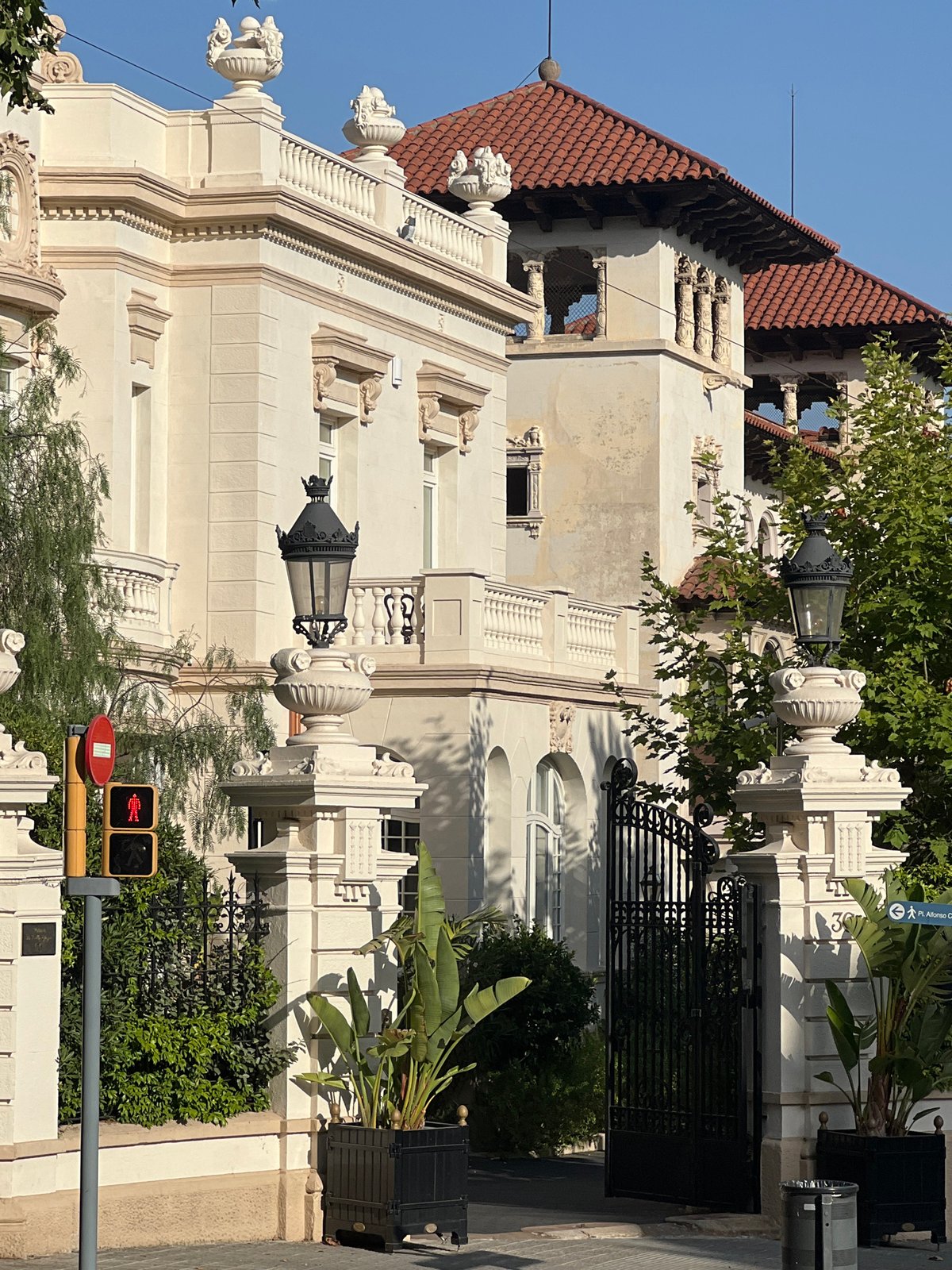 Strolling past ornate historic architecture in upscale Barcelona